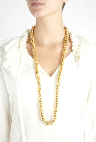 Long gold pebble necklace by Kenneth Jay Lane