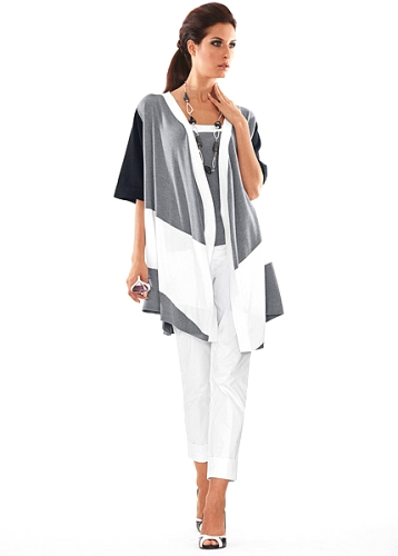 Stickad poncho