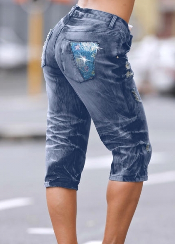 Stretchjeans i caprimodell